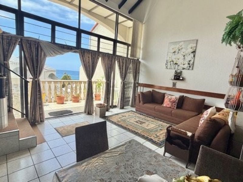 A Coastal Masterpiece — Stylish Beachfront Duplex with Panoramic Ocean Views - Photo 10