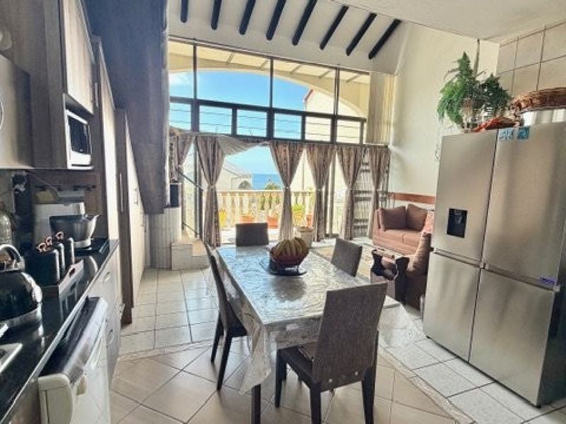 A Coastal Masterpiece — Stylish Beachfront Duplex with Panoramic Ocean Views - Photo 9