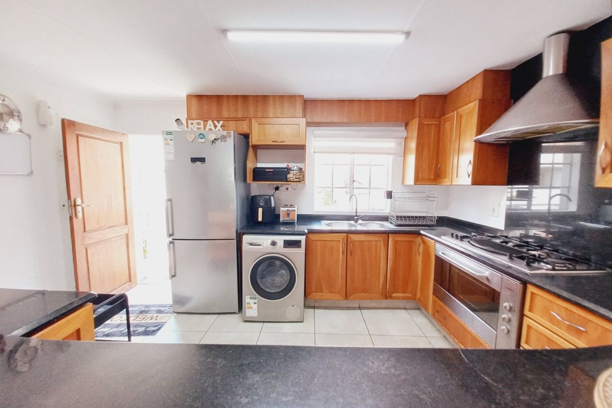 Modern Two Bedroom Starter Home Offering Secure and Effortless Living - Photo 2