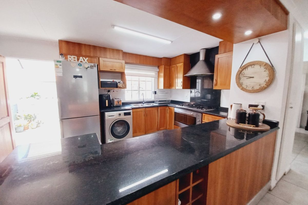 Modern Two Bedroom Starter Home Offering Secure and Effortless Living - Photo 4