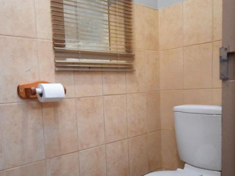 Neat 2-Bedroom Townhouse with Double-Volume Living Space in a Secure, Convenient Location - Photo 10