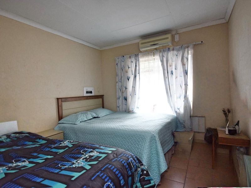 Neat 2-Bedroom Townhouse with Double-Volume Living Space in a Secure, Convenient Location - Photo 8