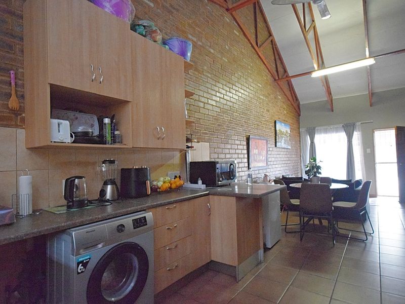 Neat 2-Bedroom Townhouse with Double-Volume Living Space in a Secure, Convenient Location - Photo 7