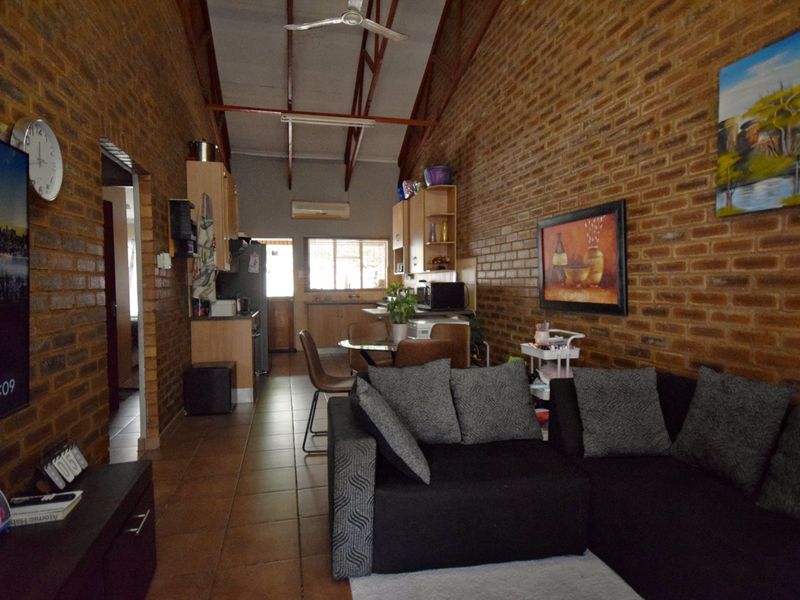 Neat 2-Bedroom Townhouse with Double-Volume Living Space in a Secure, Convenient Location - Photo 6