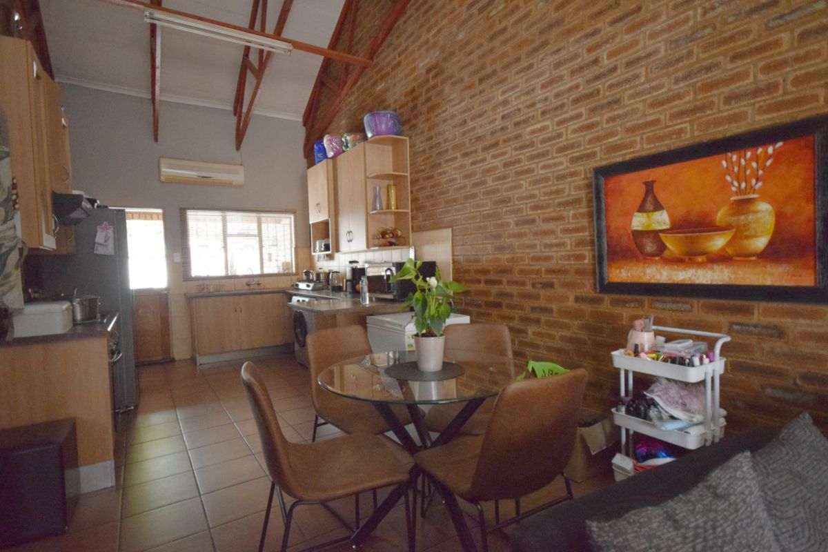 Neat 2-Bedroom Townhouse with Double-Volume Living Space in a Secure, Convenient Location - Photo 5