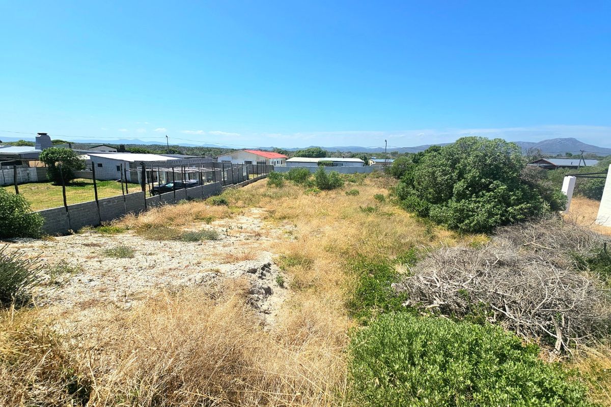 vacant land with pre-approved plans and existing water connection  - Photo 4