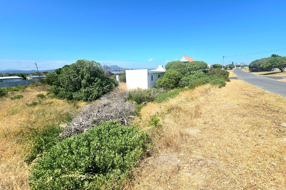 vacant land with pre-approved plans and existing water connection  - Photo 3