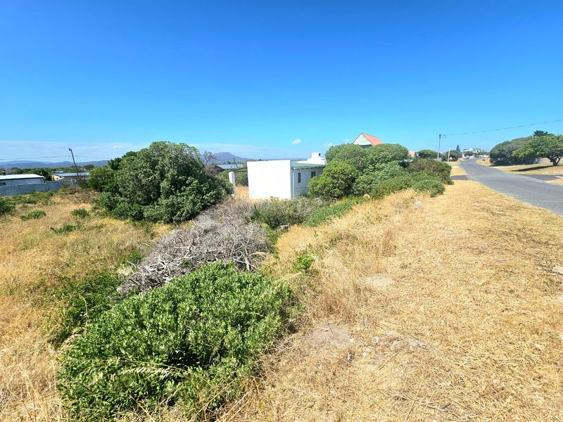 vacant land with pre-approved plans and existing water connection  - Photo 3