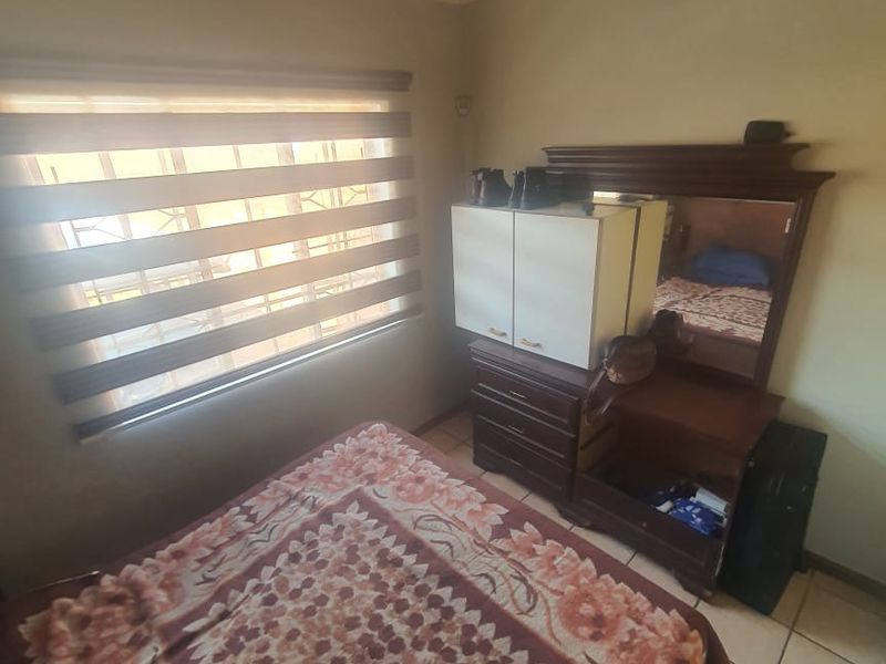 Priced to Go! Modern 2-Bedroom Gem with Solar, JoJo Tank & camera security.... - Photo 9