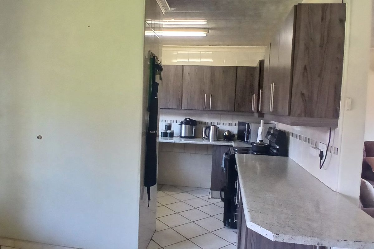 Dual Mandate - 3-Bedroom, 2-Bathroom Home for Sale - Photo 5