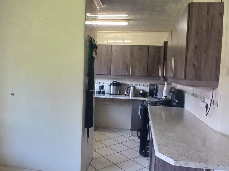 Dual Mandate - 3-Bedroom, 2-Bathroom Home for Sale - Photo 5