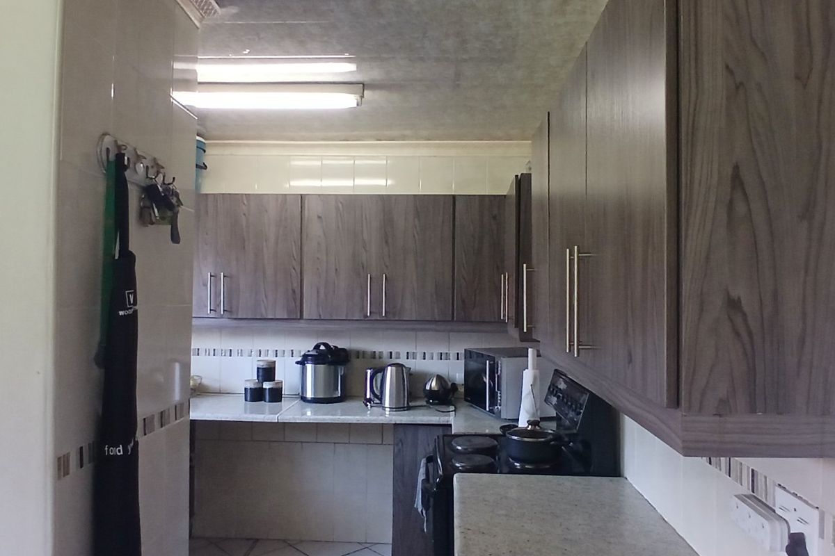 Dual Mandate - 3-Bedroom, 2-Bathroom Home for Sale - Photo 2