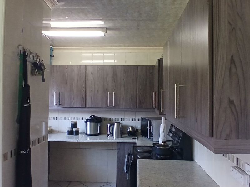 Dual Mandate - 3-Bedroom, 2-Bathroom Home for Sale - Photo 2