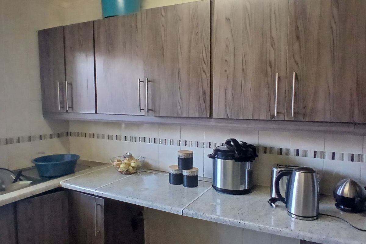 Dual Mandate - 3-Bedroom, 2-Bathroom Home for Sale - Photo 3
