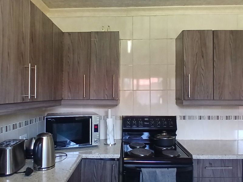 Dual Mandate - 3-Bedroom, 2-Bathroom Home for Sale - Photo 8