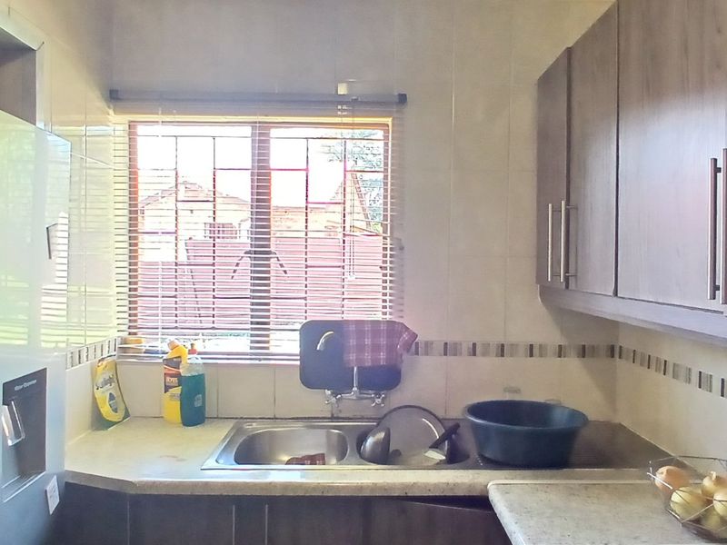 Dual Mandate - 3-Bedroom, 2-Bathroom Home for Sale - Photo 7