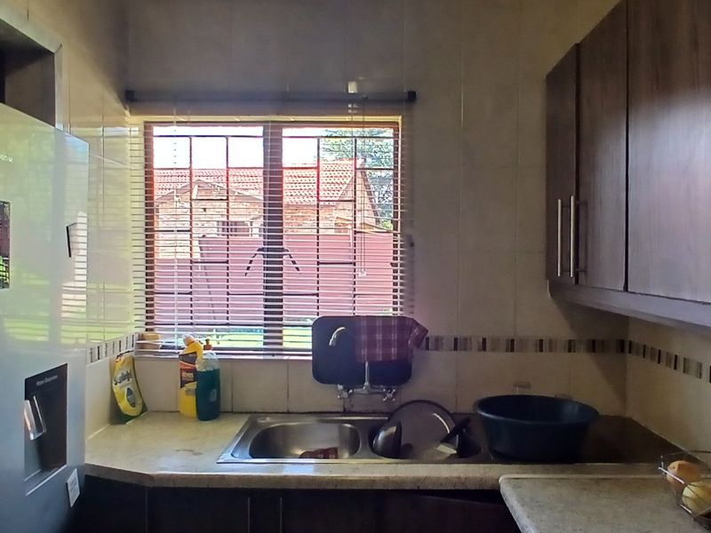 Dual Mandate - 3-Bedroom, 2-Bathroom Home for Sale - Photo 6