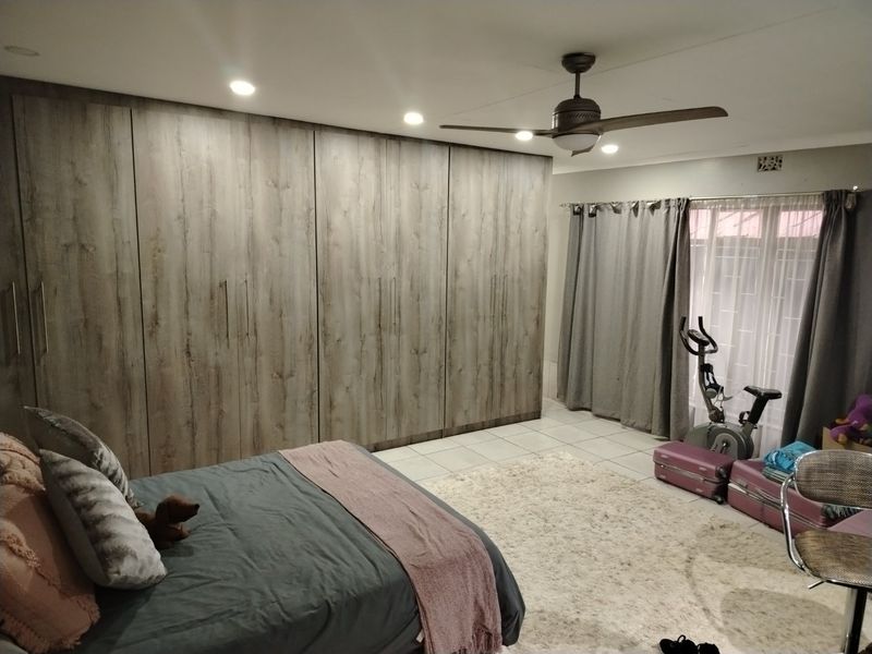 "Move-In Ready! Abundant Storage and a Lush Garden in This 4-Bed Gem." - Photo 8