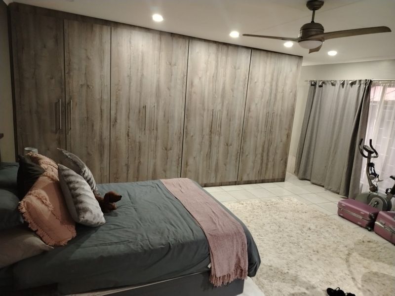 "Move-In Ready! Abundant Storage and a Lush Garden in This 4-Bed Gem." - Photo 7