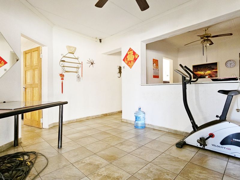 A solid home with a pool in Falcon Ridge. - Photo 5