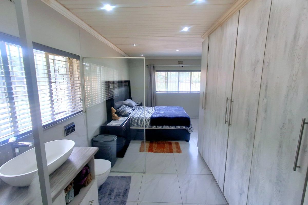 Modern, Spacious 3-Bedroom Home Perfectly Located on a Corner Stand with Endless Potential - Photo 3