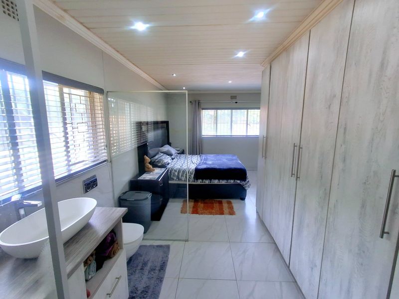 Modern, Spacious 3-Bedroom Home Perfectly Located on a Corner Stand with Endless Potential - Photo 3