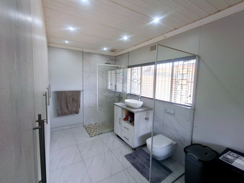 Modern, Spacious 3-Bedroom Home Perfectly Located on a Corner Stand with Endless Potential - Photo 9