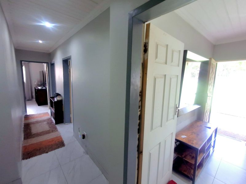 Modern, Spacious 3-Bedroom Home Perfectly Located on a Corner Stand with Endless Potential - Photo 7