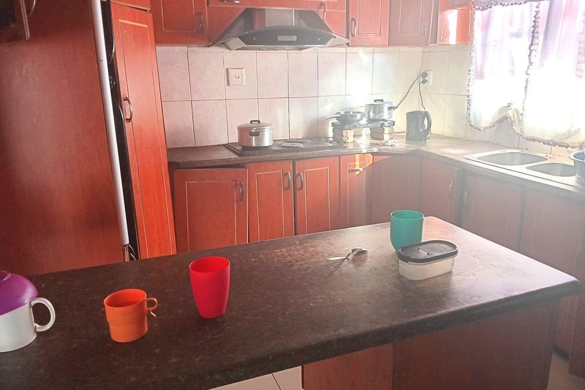House with cherrywood kitchen, close to police station and school extra Income - Photo 2