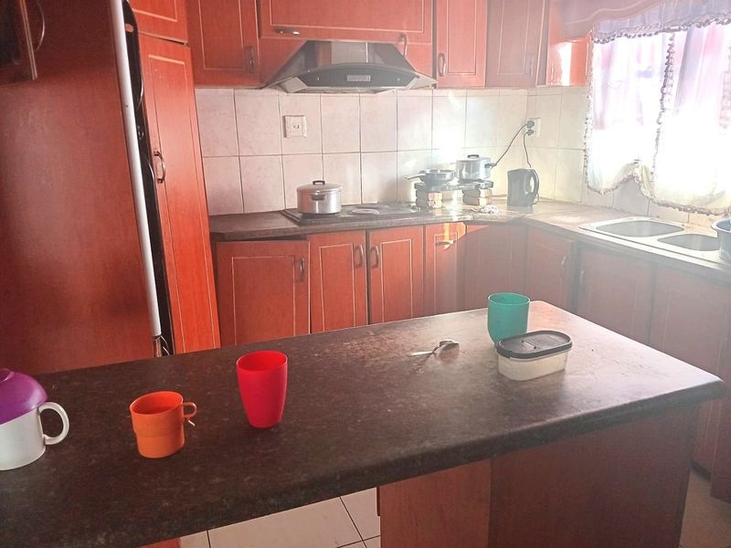 House with cherrywood kitchen, close to police station and school extra Income - Photo 2