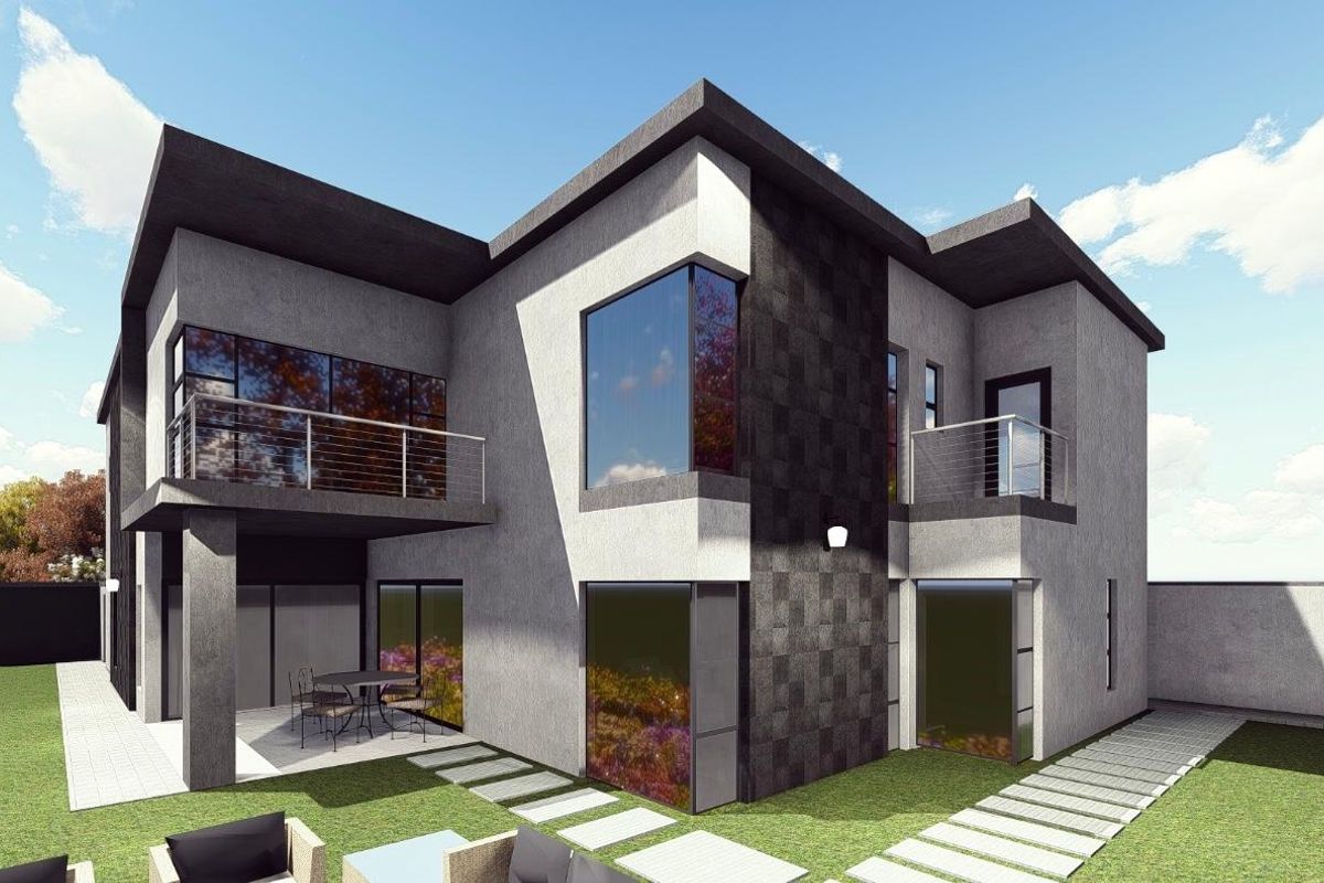 Modern double-story residential exterior featuring stone cladding, large glass windows, upper-level balconies with stainless steel railings, and a paved patio area.