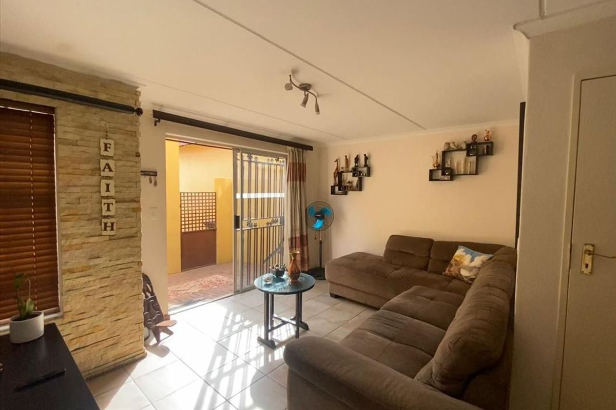 Charming Home with Practical Living Spaces - Photo 2