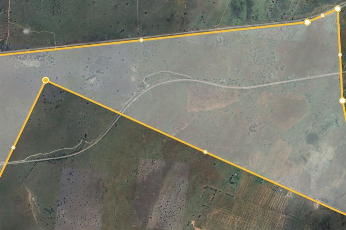 An aerial view of the farm property showing the land boundaries and internal access roads.