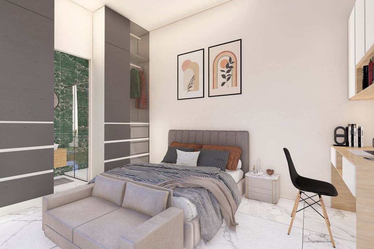 Modern bedroom featuring built-in floor-to-ceiling wardrobes, integrated desk workspace, and an en-suite bathroom with marble-style wall finishes.