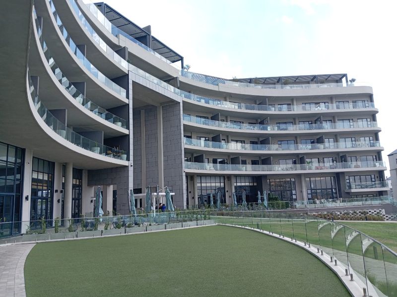 Waterfall Living: Modern 2-Bed Apartment - Photo 1