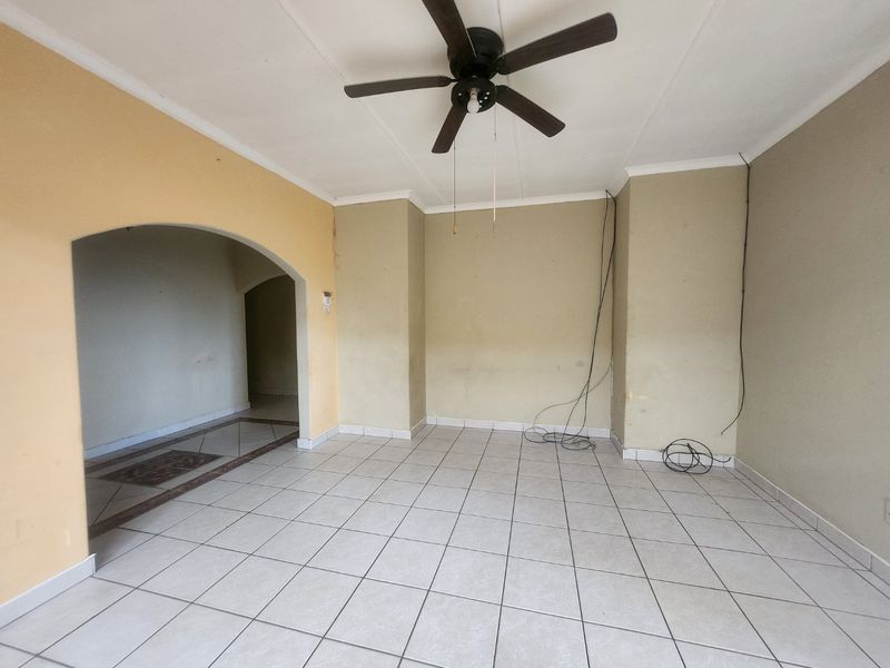 A well-designed property offering dual-living convenience and a double garage. - Photo 2