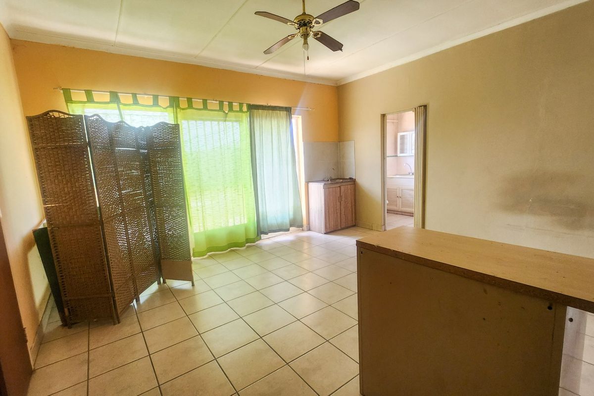 A well-designed property offering dual-living convenience and a double garage. - Photo 4