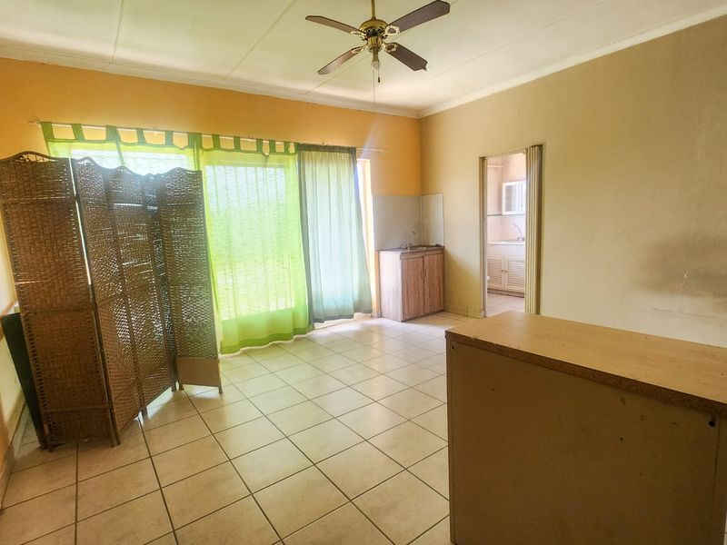 A well-designed property offering dual-living convenience and a double garage. - Photo 4