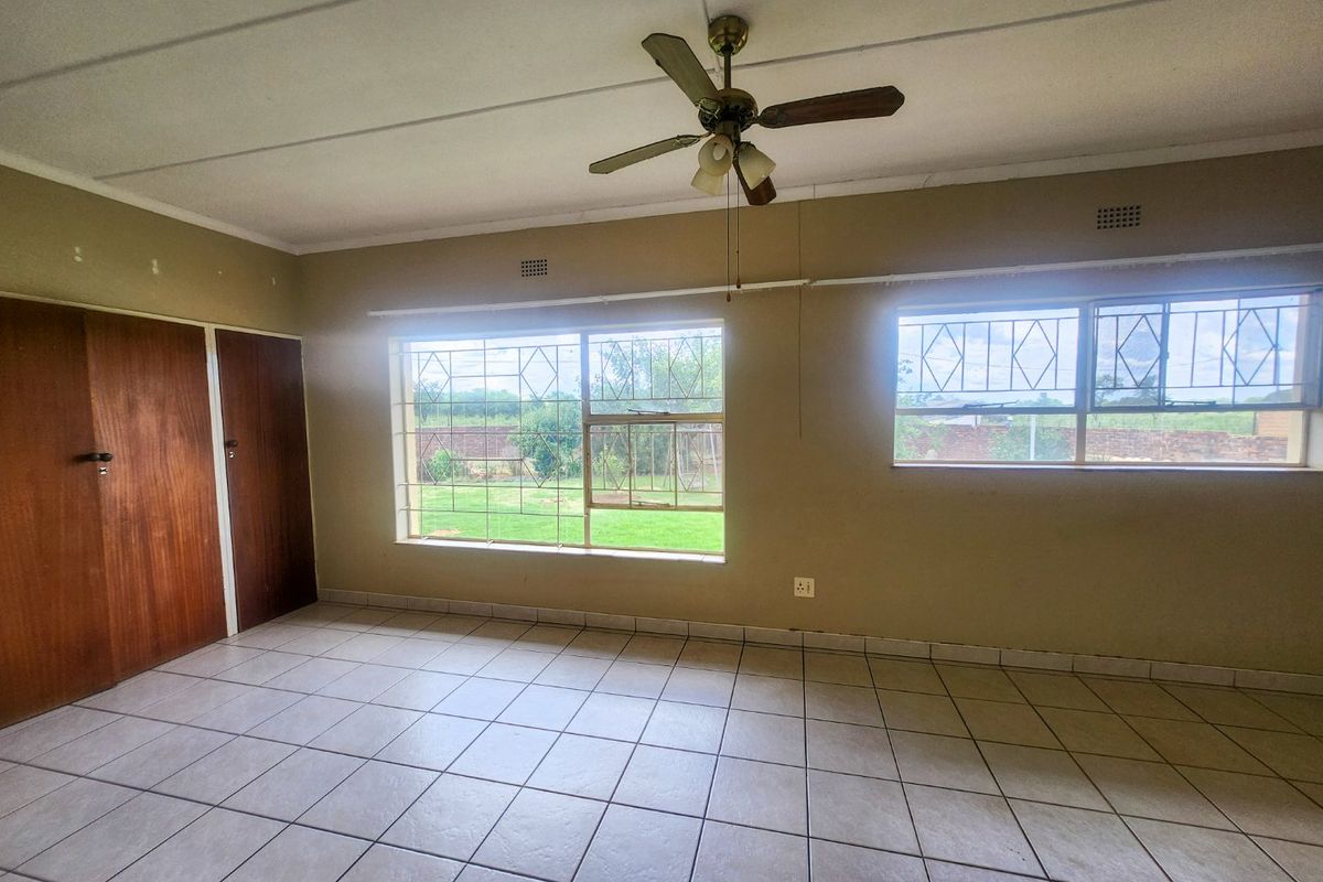 A well-designed property offering dual-living convenience and a double garage. - Photo 3