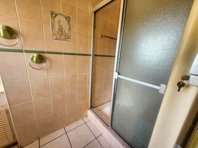 A well-designed property offering dual-living convenience and a double garage. - Photo 9