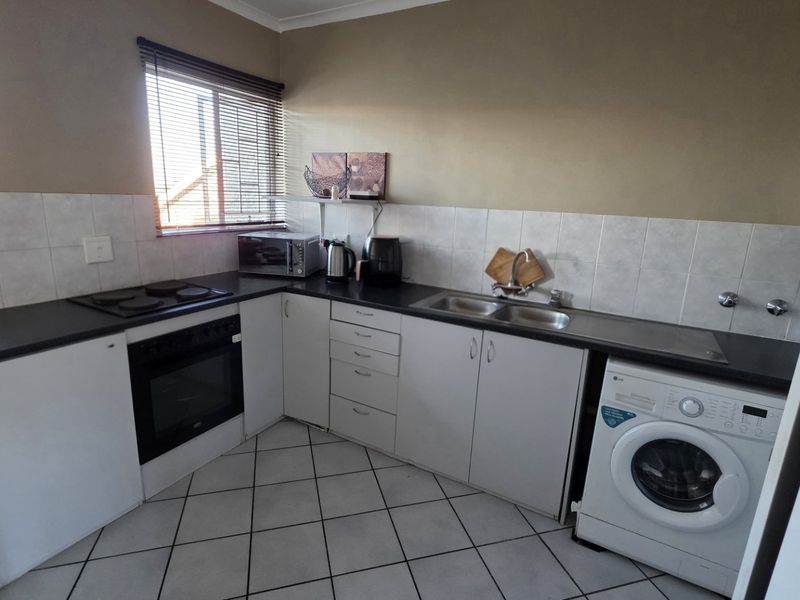 Secure Magalieskruin Townhouse with Balcony - Photo 8