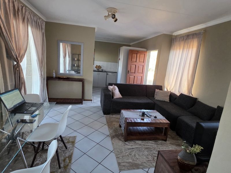 Secure Magalieskruin Townhouse with Balcony - Photo 7