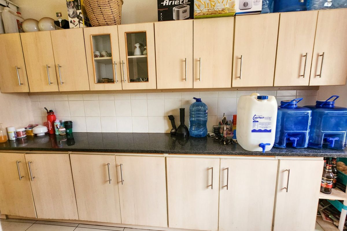 A neat three-bedroom, two-bathroom home with a double garage and a large yard for easy, comfortable living. - Photo 5