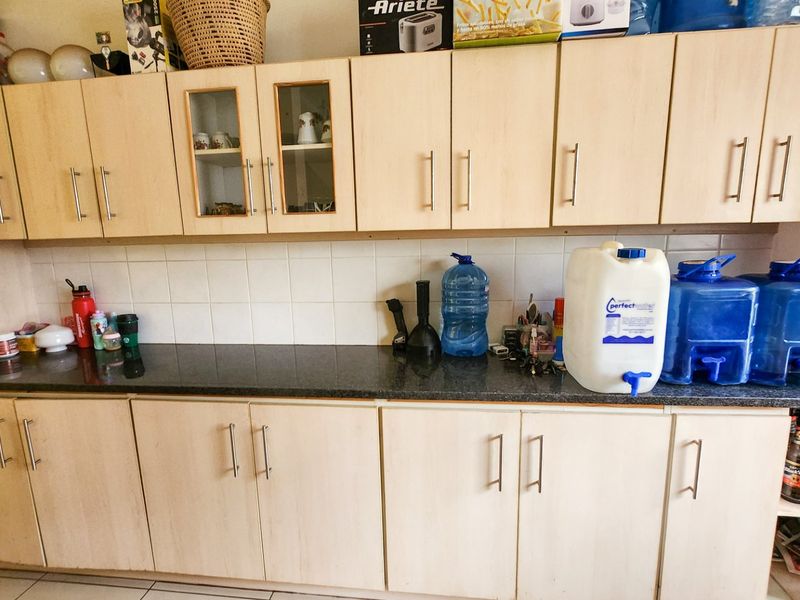 A neat three-bedroom, two-bathroom home with a double garage and a large yard for easy, comfortable living. - Photo 5