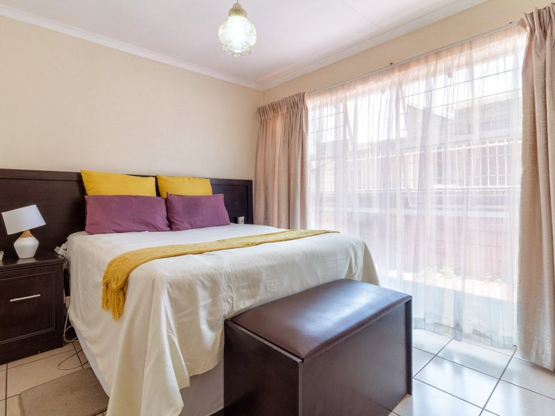 Charming 3-Bedroom Family Home in a Secure Krugersdorp Complex - Photo 6