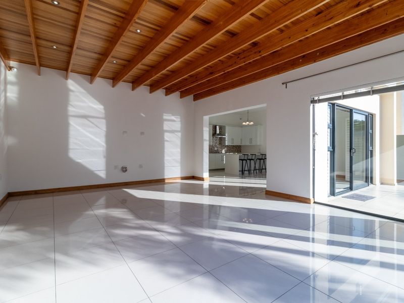 Luxury Cluster Living with Heated Pool, Solar Power & Designer Finishes - Photo 7