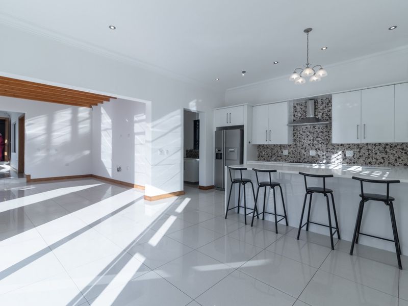 Luxury Cluster Living with Heated Pool, Solar Power & Designer Finishes - Photo 5
