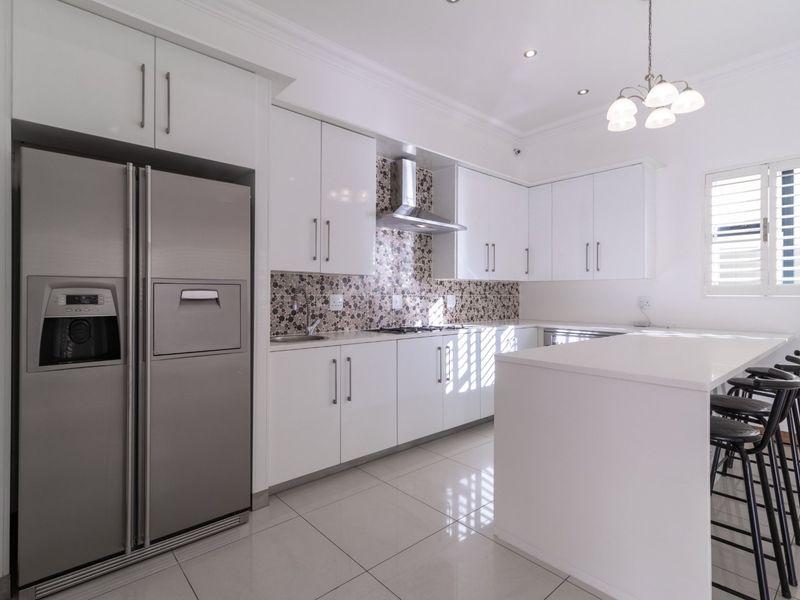 Luxury Cluster Living with Heated Pool, Solar Power & Designer Finishes - Photo 6