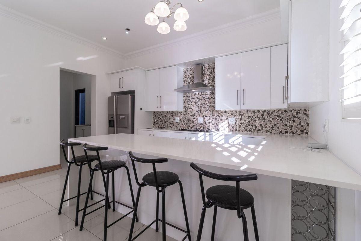 Luxury Cluster Living with Heated Pool, Solar Power & Designer Finishes - Photo 3