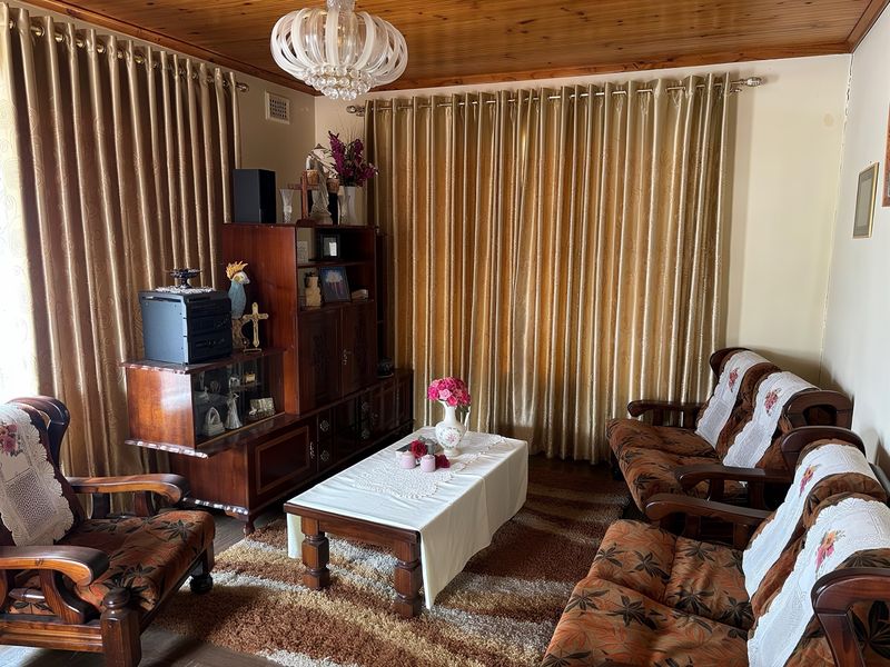 Price Reduced: A Tender Hug of Character in this Spacious Family Home with Income-Generating Flatlet and Secure Convenience. - Photo 5